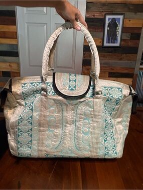 New without tags Mangaya Weekender Banda Bag with wheels!
